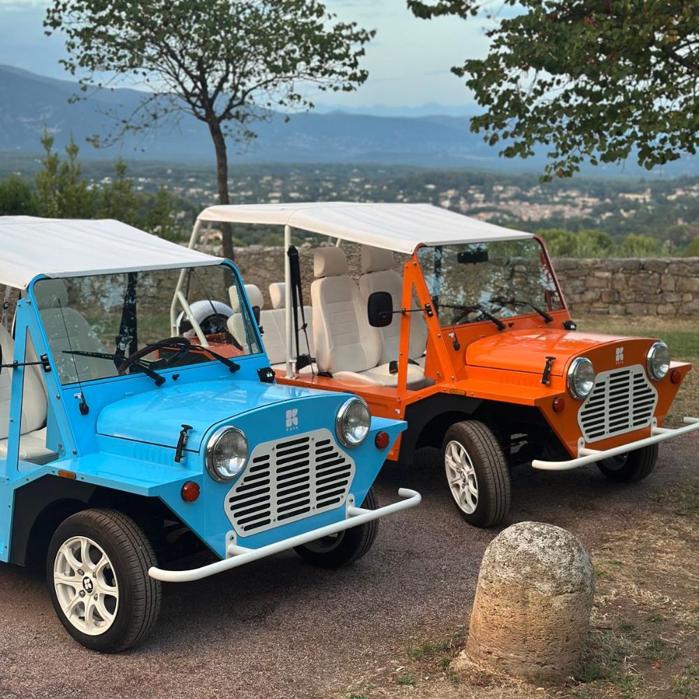 Blue and orange Mini Moke in the Provençal hinterland
